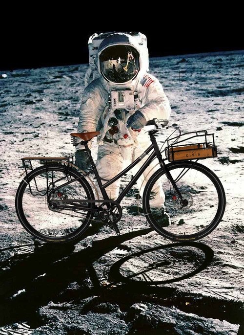 Astronaut Pete Conrad smuggled a bicycle on board Apollo 12. Here he is seen just before setting out to visit the desk. Apparently he didn't make it there as he got a puncture in his front tyre.